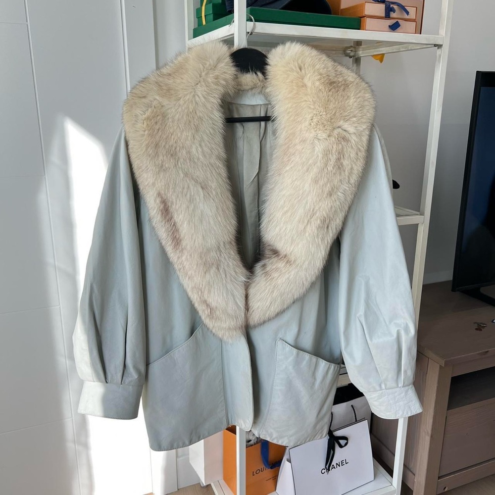 Genuine leather coat with fur collar